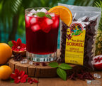 Refreshing Caribbean sorrel hibiscus drink with ice, orange slice, and sun-dried sorrel petals—premium beverage ingredients available in Canada.