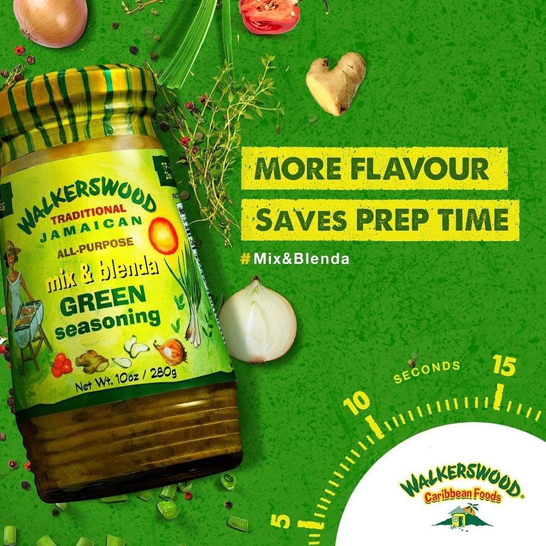 Walkerswood Traditional Jamaican Mix & Blenda Green Seasoning 10oz jar surrounded by fresh herbs, onions, thyme, and ginger – more flavor, saves prep time, authentic Caribbean taste available in Canada.